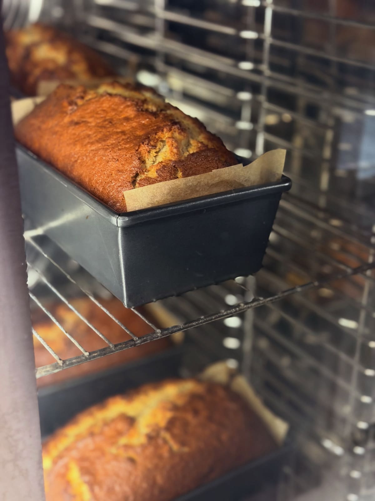 Some bananas end up in the bin. Ours get promoted. Our banana bread has been stealing the show from